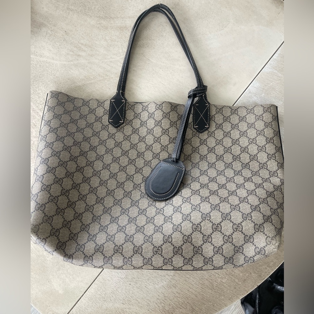 Authentic, good condition overall except the handles are a little worn off